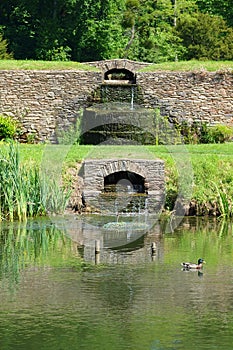 Pond and waterfalls at historic English house