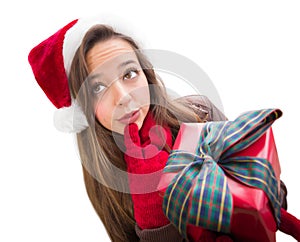 Pondering Teenager Wearing A Christmas Santa Hat with Bow Wrapped Gif