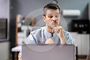 Pondering Thinking Professional Businessman In Office
