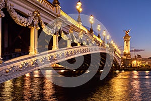 Pont Alexandre III bridge and Seine River at sunset. Paris, France