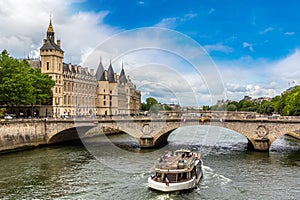 Pont au Change bridge over Seine river and Conciergerie palace and prison in Paris, France