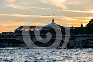 Pont de la Concorde and the Grand Palais of Paris after sunset