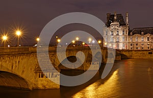 The Pont du Carrousel is a bridge in Paris, which spans the River Seine between the Quai des Tuileries and the Quai