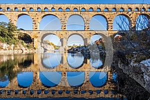 The Pont du Gard. Ancient Roman aqueduct bridge over Gardon river. Photography taken in France photo