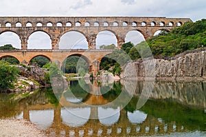 Pont du Gard - Panoramic view of ancient old Roman Aqueduct Pont du Gard ear Vers-Pon-du-Gard, Occitanie, France, Europe