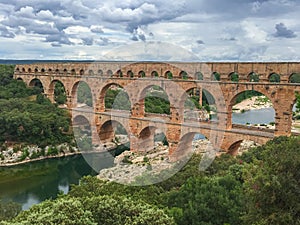 Pont du Gard - Panoramic view of ancient old Roman Aqueduct Pont du Gard ear Vers-Pon-du-Gard, Occitanie, France, Europe