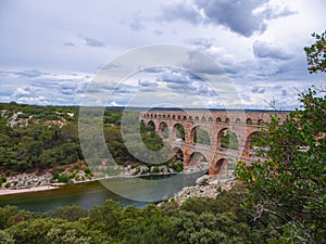 Pont du Gard - Panoramic view of ancient old Roman Aqueduct Pont du Gard ear Vers-Pon-du-Gard, Occitanie, France, Europe