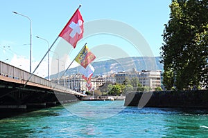 Pont du Mont Blanc and tip of Ile Rousseau in Rhone river, Geneva, Switzerland photo