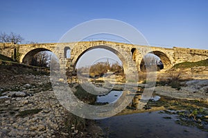 Pont Julien, roman stone arch bridge over Calavon river, Provence, France