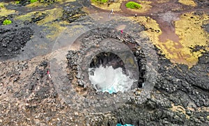 Pont Naturel, Mauritius Island. Beautiful arch rock formation from a drone viewpoint