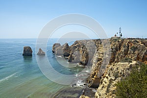 Ponta da Piedade cliffs. Travel destination in Europe