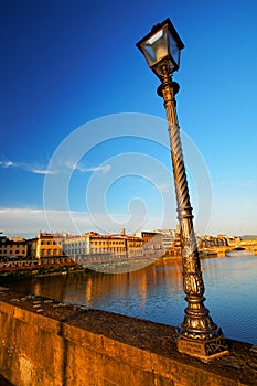 The Ponte alla Carraia over Arno and the right bank of the river in Florence. photo