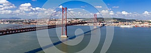 Ponte 25 de Abril Bridge in Lisbon, Portugal. Connects the cities of Lisbon and Almada crossing the Tagus River photo