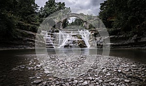 Ponte della Brusia and its waterfall, Italy