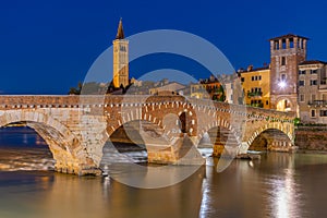 Ponte di Pietra. Bridge in Verona during night, Italy,