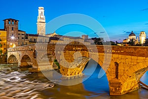 Ponte di Pietra. Bridge in Verona during night, Italy,