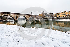 Ponte Pietra and Adige River - Ancient stone bridge in Verona Italy