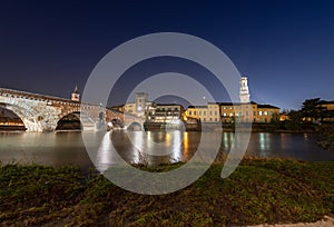 Ponte Pietra and Adige River at night - Verona Italy