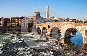 Ponte Pietra Pons Marmoreus and the River Adige at sunny morning, Verona, Italy