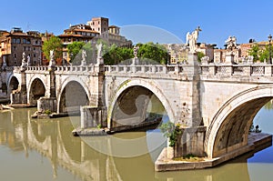 Ponte Sant Angelo spanning the Tiber between Castel Sant Angelo and the Centro Storico, Rome Italy photo