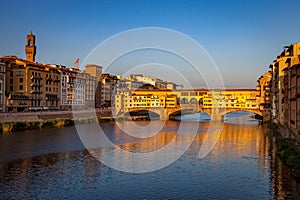 Ponte Vecchio and Arno River at Sunset in Florence Italy