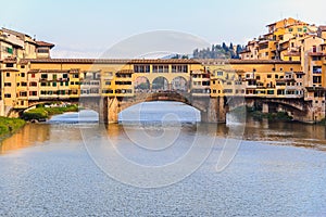 Ponte Vecchio bridge in Florence at sunset, Italy