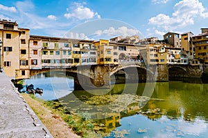 Ponte Vecchio bridge over the Arno River in Florence Italiy, colourful bridge over the river in Florence