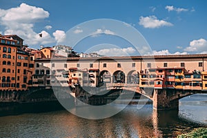 Ponte Vecchio bridge and river Arno in Florence Italy