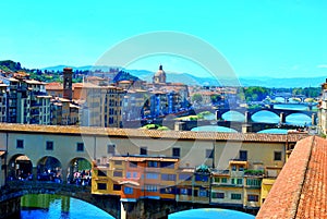Ponte Vecchio is a medieval bridge over the Arno River in Florence. photo