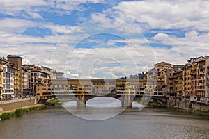 The Ponte Vecchio, a medieval stone closed-spandrel segmental arch bridge over the Arno River