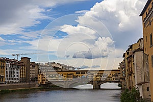 The Ponte Vecchio, a medieval stone closed-spandrel segmental arch bridge over the Arno River