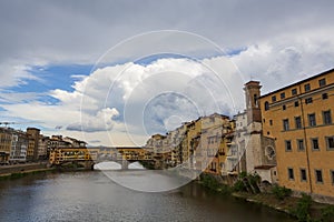 The Ponte Vecchio, a medieval stone closed-spandrel segmental arch bridge over the Arno River