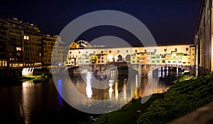 Ponte Vecchio night view over Arno river in Florence