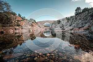 Ponte Vecchiu bridge over the Fango river in Corsica photo