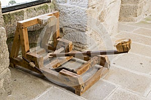 Catapult in a medieval castle photo