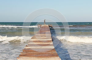 Pontoon of the beach of Muro located at bay Alcudia Majorca Spain