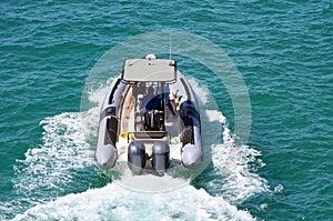 Pontoon Sports Fishing Boat Powered by Two Outboard Engines photo