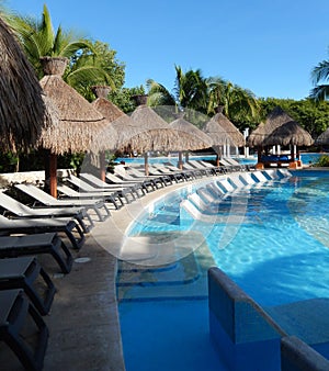 Pool amenities at a tropical resort in Cancun, Mexico