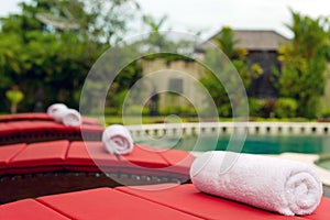 Pool in backyard with a towel