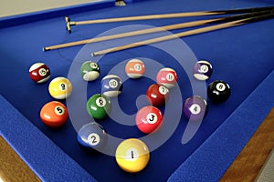 Pool balls and cues
