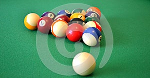 Pool balls on green felt