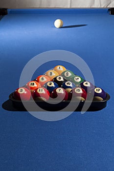 Pool billiard balls in a plastic rack - commonly used starting p