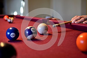 Pool billiard balls set on felt pool table