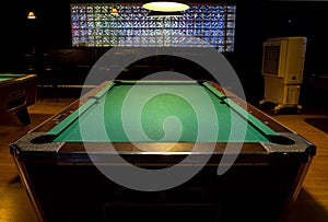 Pool, Billiards Table Illuminated In A Dark Setting