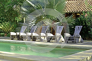 Pool chairs at resort