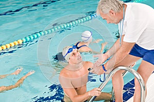 Pool coach - swimmer training competition