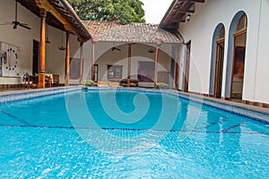 Pool in a colonial garden from a house photo