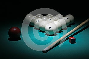 Pool equipment. Balls pyramid with number 8 ball o photo