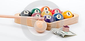 Pool game rack of 9 ball with money and chalk