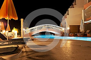 Pool of Greek hotel at night